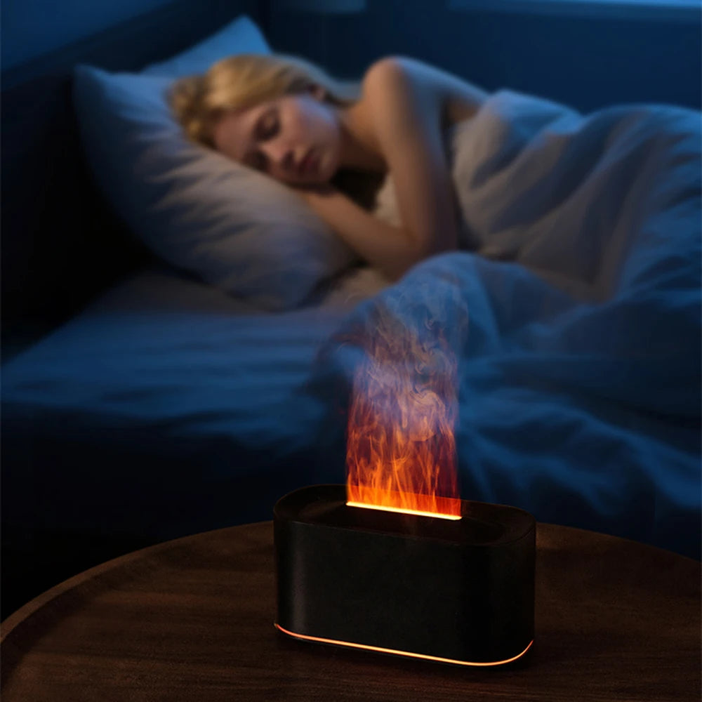 Difusor de aroma efecto llama en la mesita de noche